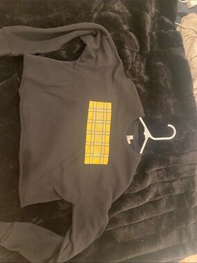 Bella Canvas Black Crewneck Sweater with Yellow Plaid Chest Graphic